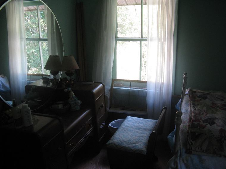 A quiet bedroom prepared for rest